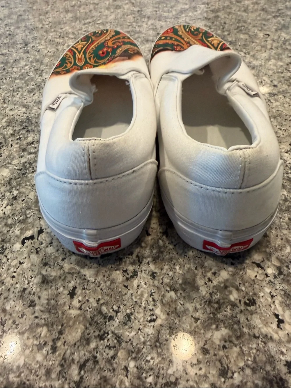 Vans White Slip-On Sneakers with Green, Red, Yellow Paisley and Burn-Effect